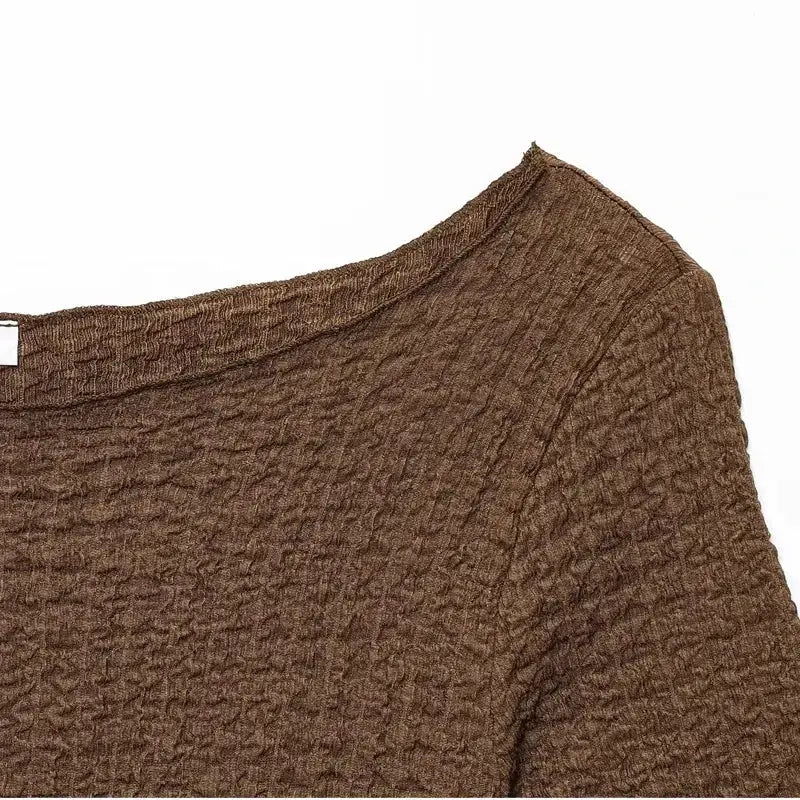 Close-up of brown textured fabric top from two piece wide leg pant set by The Lady's Haven Boutique