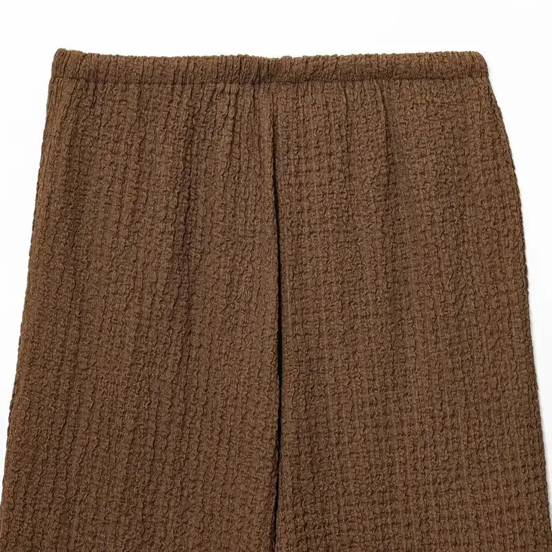 Close-up of brown textured fabric from two piece wide leg pant set by The Lady's Haven Boutique