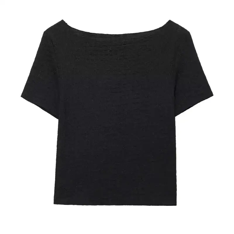 Black top from two piece wide leg pant set by The Lady's Haven Boutique with short sleeves and textured fabric