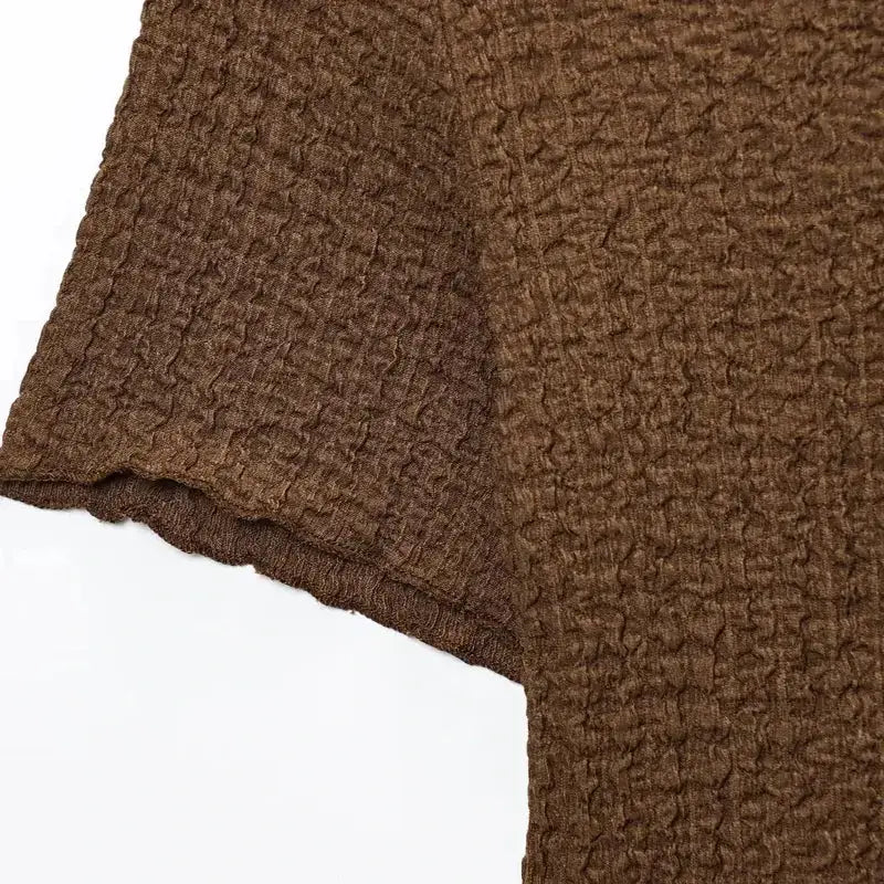 Close-up of brown textured fabric from The Lady's Haven Boutique two piece wide leg pant set