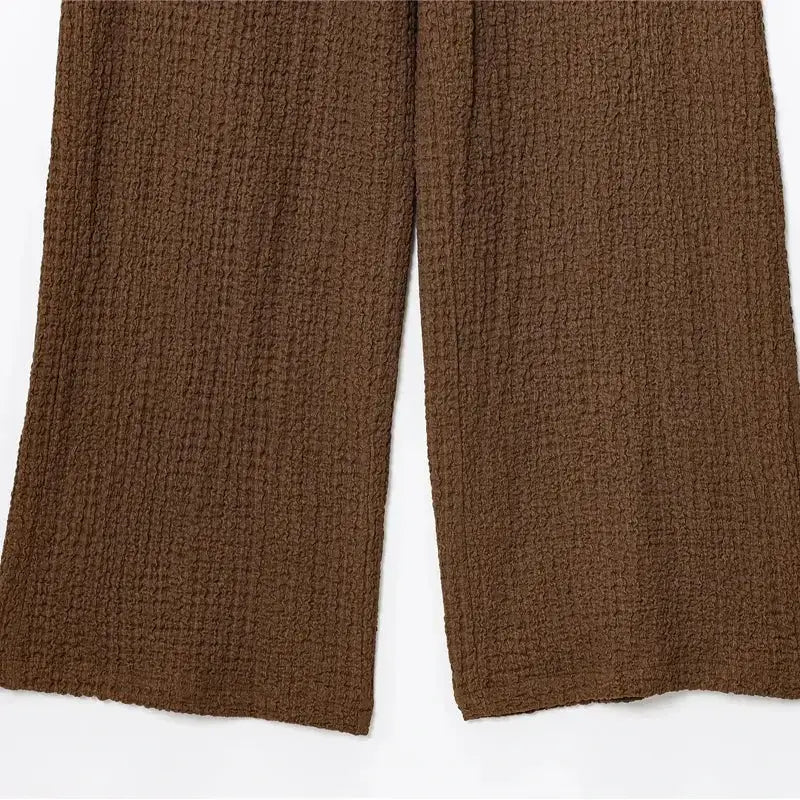 Brown textured fabric detail of two piece wide leg pant set from The Lady's Haven Boutique