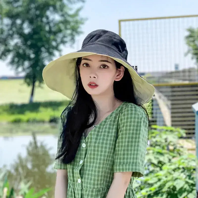 Stylish UPF 50 sun protection hat featuring a wide brim for outdoor activities