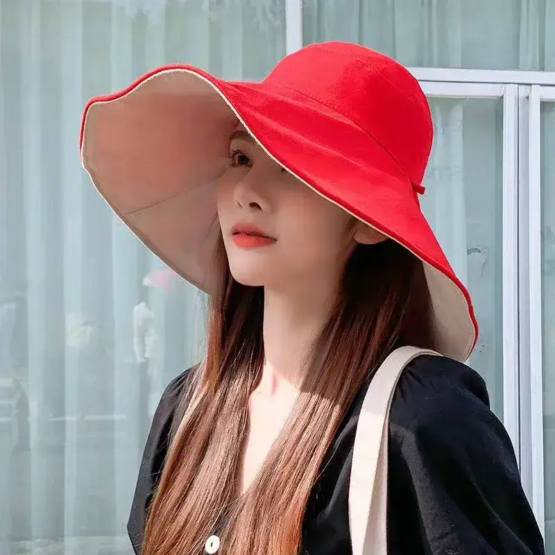 Stylish red UPF 50 sun protection hat from The Lady's Haven Boutique for outdoor adventures
