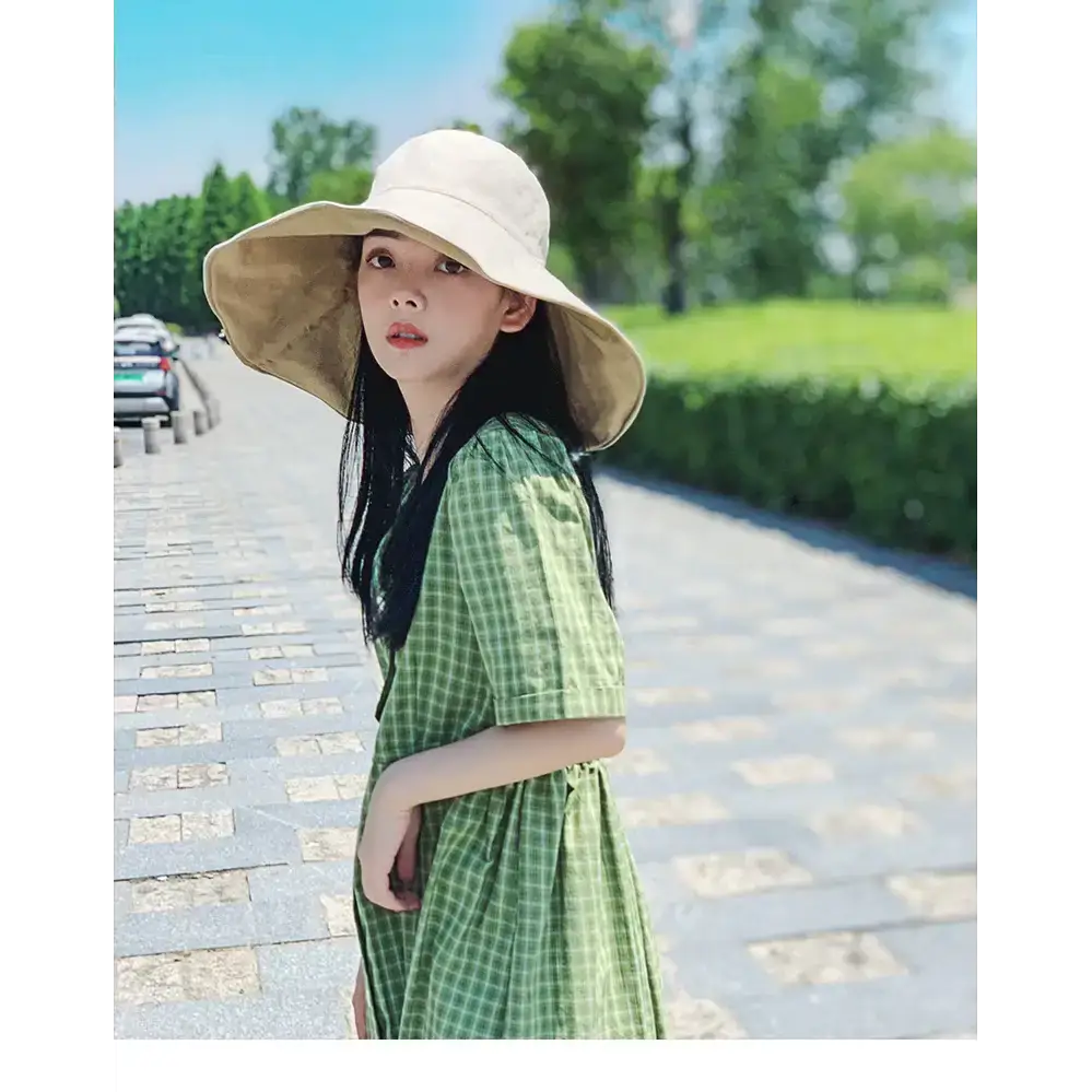 Stylish UPF 50 sun protection hat from The Lady's Haven Boutique for sunny outdoor adventures