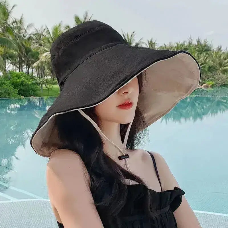 Stylish black hat with wide brim offering UPF 50 sun protection hat for outdoor activities