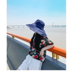 Floral print hat perfect for outdoor wear with UPF 50 sun protection hat featured against a scenic backdrop