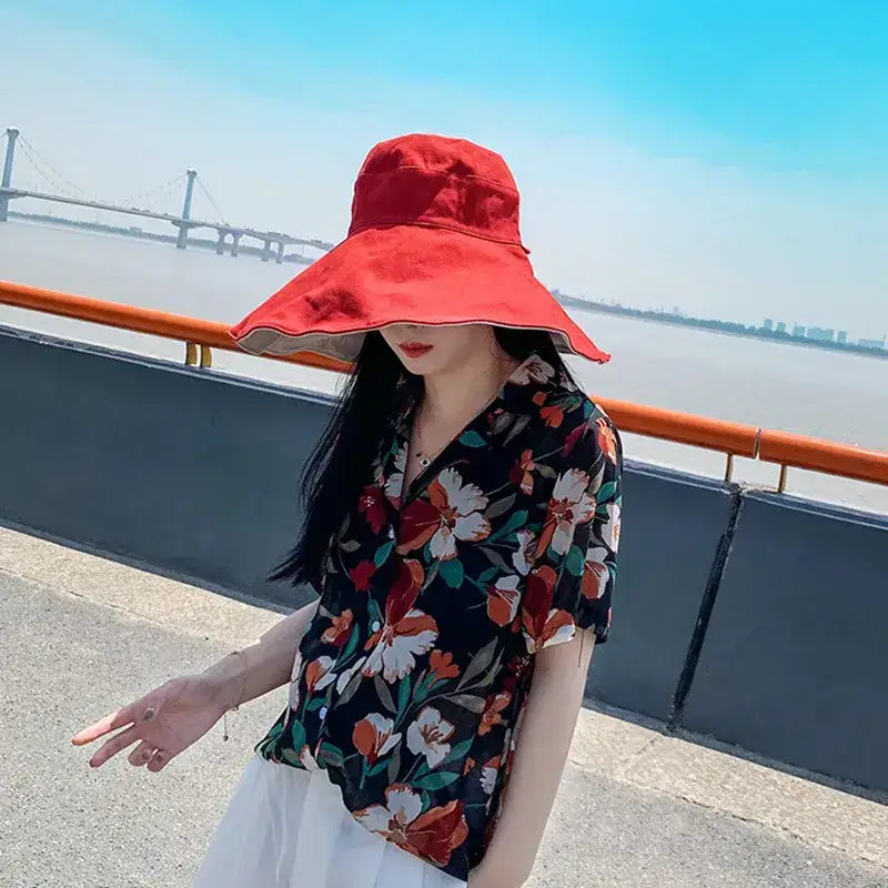 Stylish red UPF 50 sun protection hat perfect for summer outings and outdoor activities