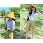 Women's stylish UPF 50 sun protection hat in yellow, perfect for sunny outdoor activities