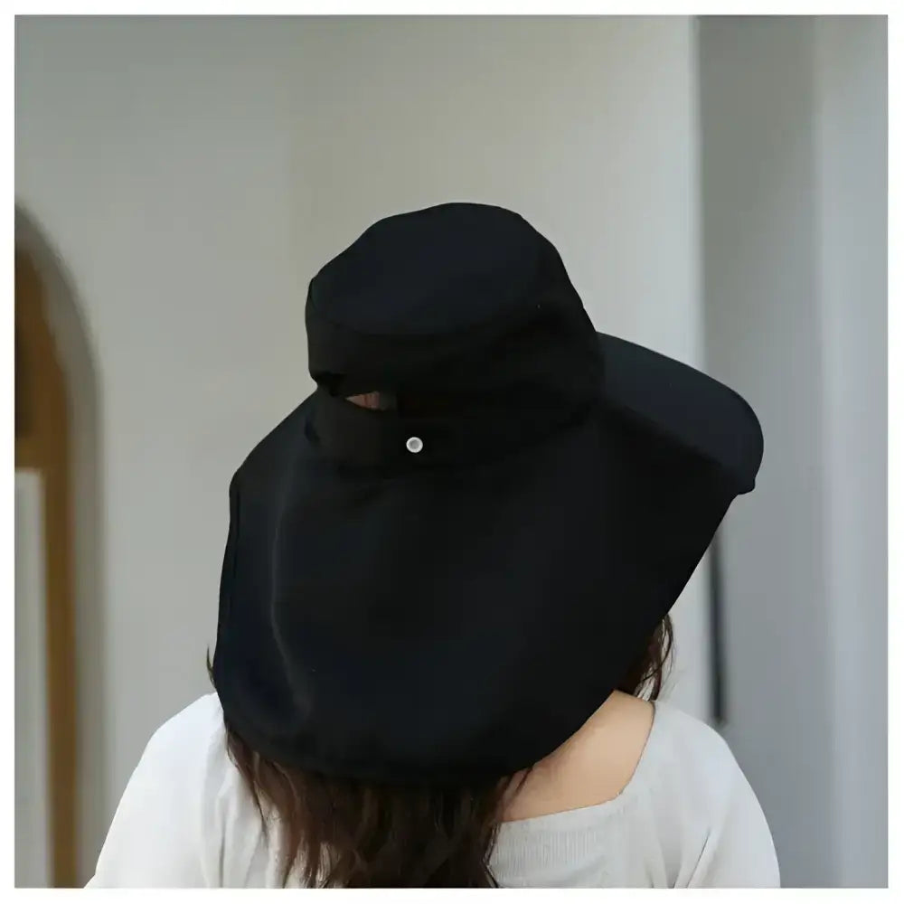 Ladies UV sun protection bucket hat in black with wide brim for outdoor sun safety