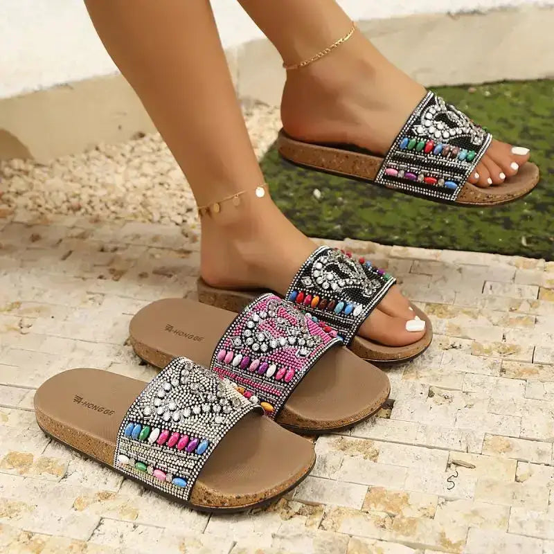 Flat heel sandals with colorful beaded design perfect as ladies vacation beach slippers from The Lady's Haven Boutique