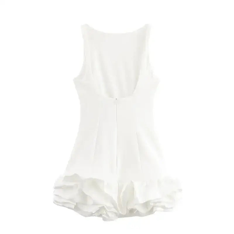 The Lady's Haven Boutique white summer party mini dress with ruffled hem and sleeveless design