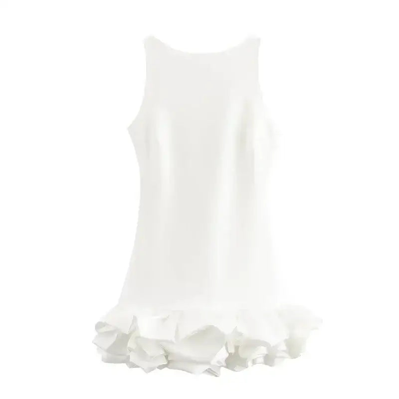 White summer party mini dress with sleeveless design and ruffled hem from The Lady's Haven Boutique