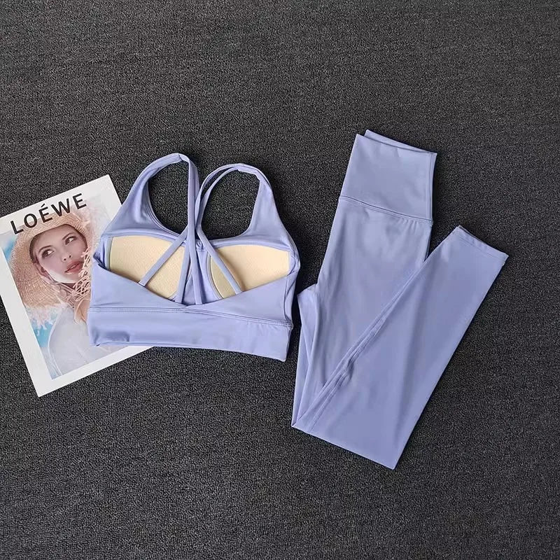 Ladies workout clothes set featuring a lavender sports bra and matching leggings for activewear enthusiasts