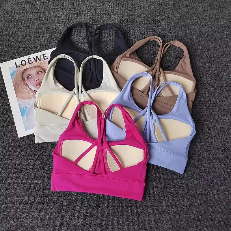 Collection of soft and stylish ladies workout clothes set including various sporty bras in multiple colors