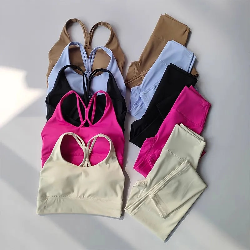 Variety of ladies workout clothes set including sports bras and leggings in multiple colors