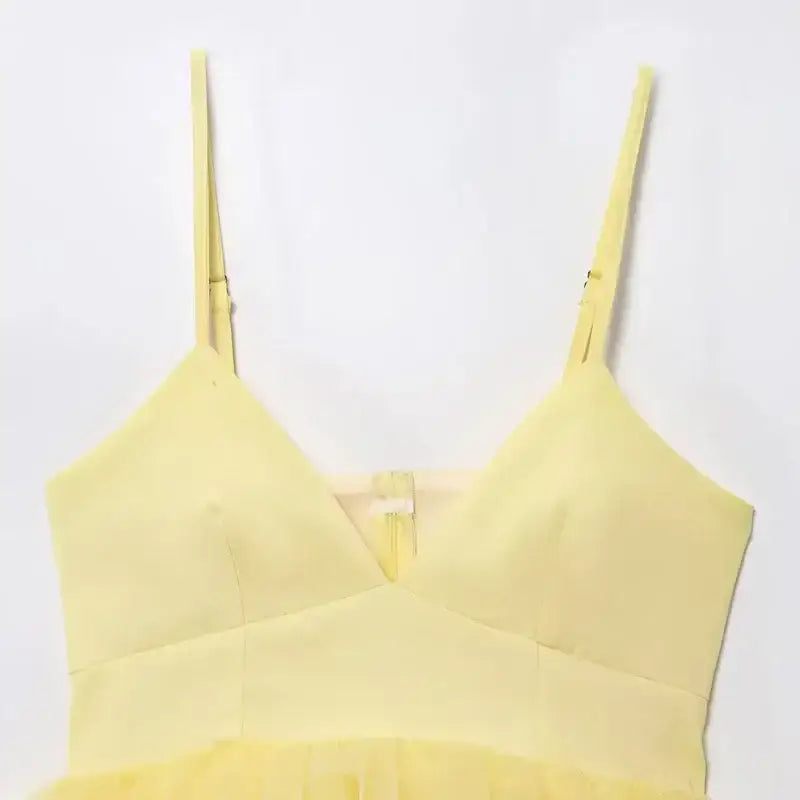 Yellow puffy sleeveless summer top with adjustable thin straps from The Lady's Haven Boutique