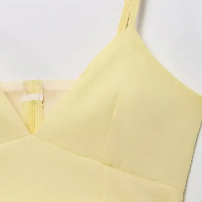 Light yellow puffy sleeveless summer top with thin straps from The Lady's Haven Boutique