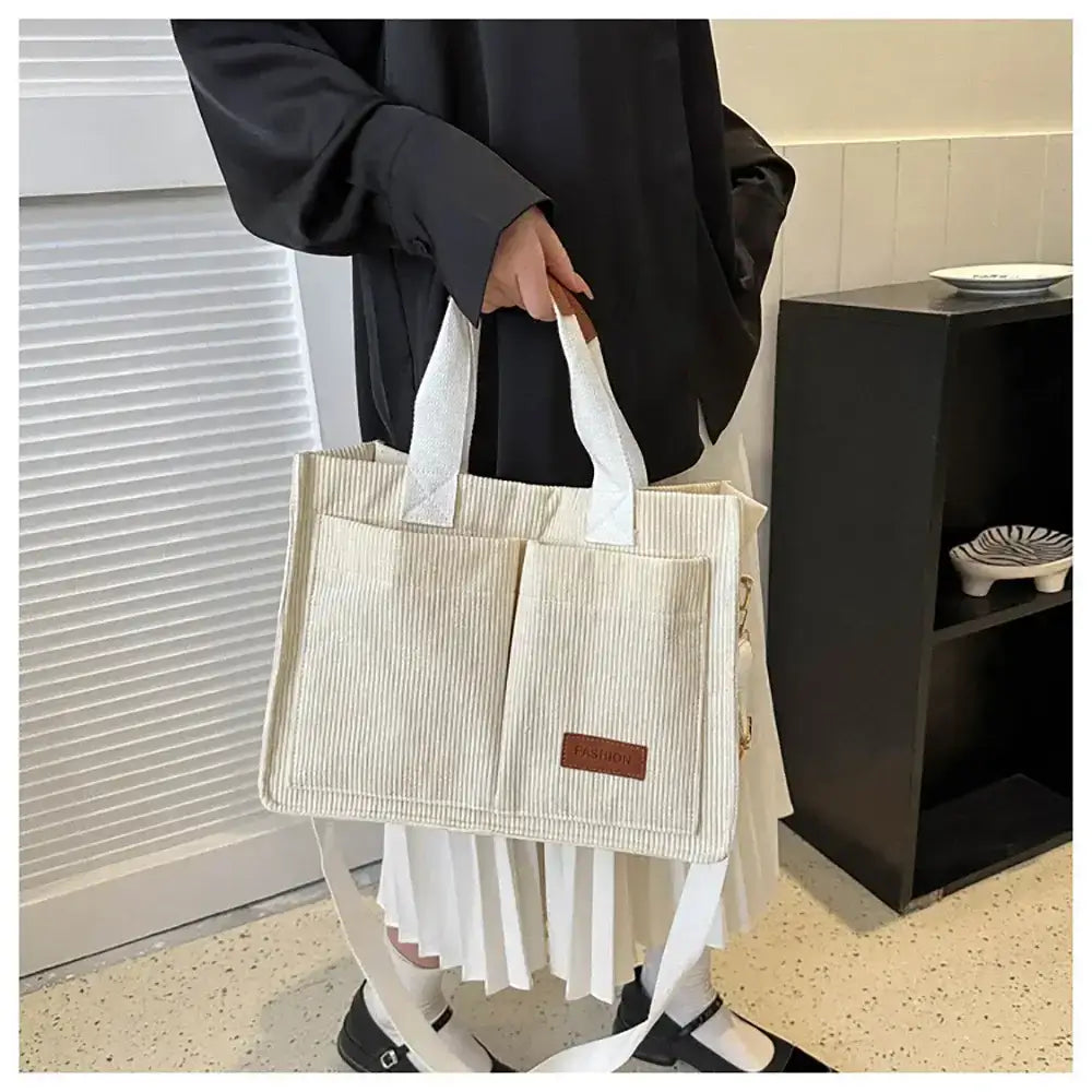 The Lady's Haven large capacity handbag in cream with dual pockets and stylish design