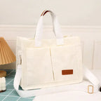 Stylish cream handbag with large capacity handbag design and multiple pockets for organized storage
