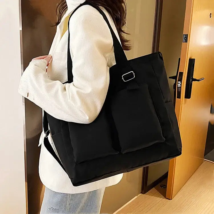 Chic black large capacity shopper handbag with spacious design and stylish pockets for everyday use