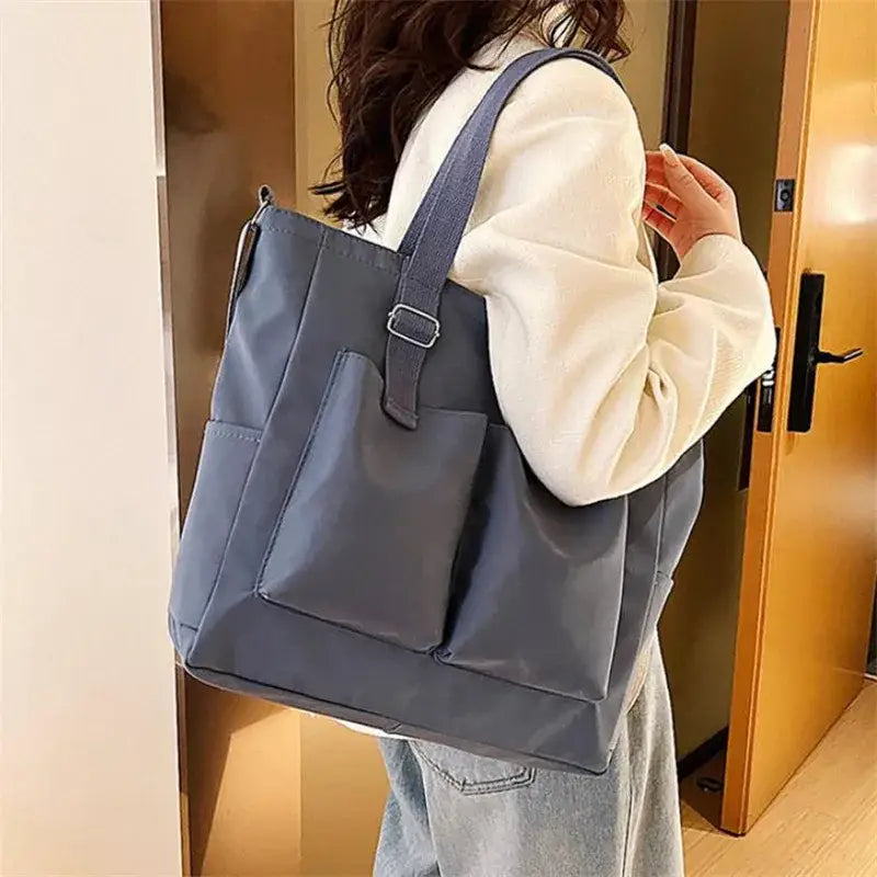 Stylish large capacity shopper handbag in gray, perfect for daily use and errands