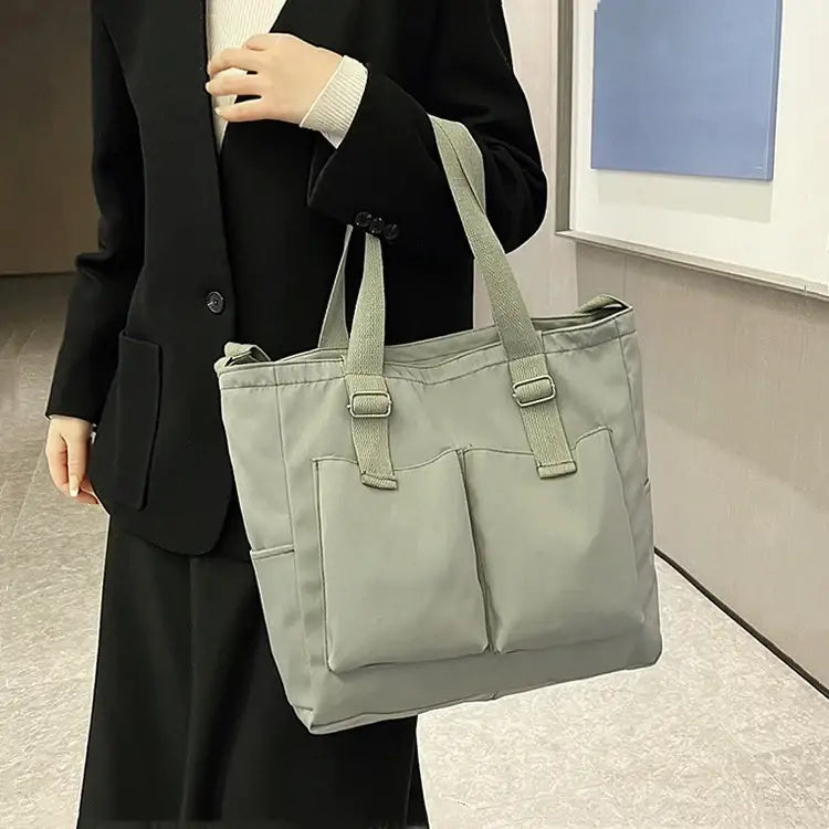 Large capacity shopper handbag in grey with sturdy straps for everyday use