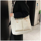 Stylish large capacity shopper handbag in cream color with pockets, perfect for everyday use
