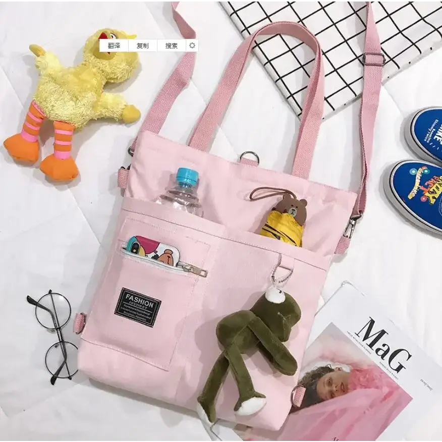 Large capacity tote bag for women in pink with multiple pockets and trendy accessories
