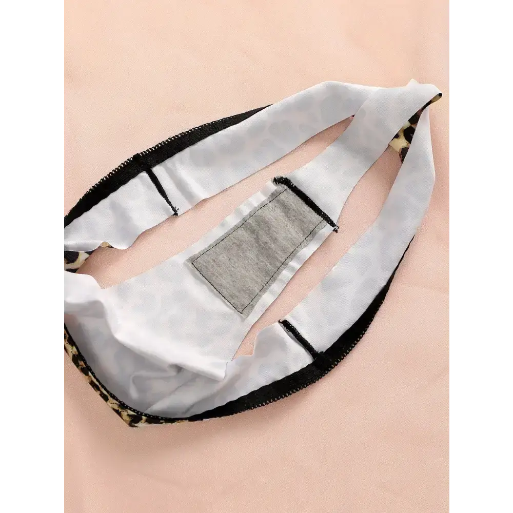 Inside view of leopard print thong underwear showing fabric and stitching details