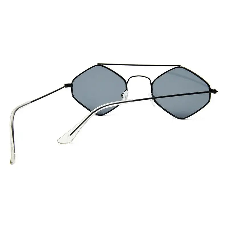 Stylish luxury ladies sunglasses with a metal frame and unique hexagonal design for a trendy look