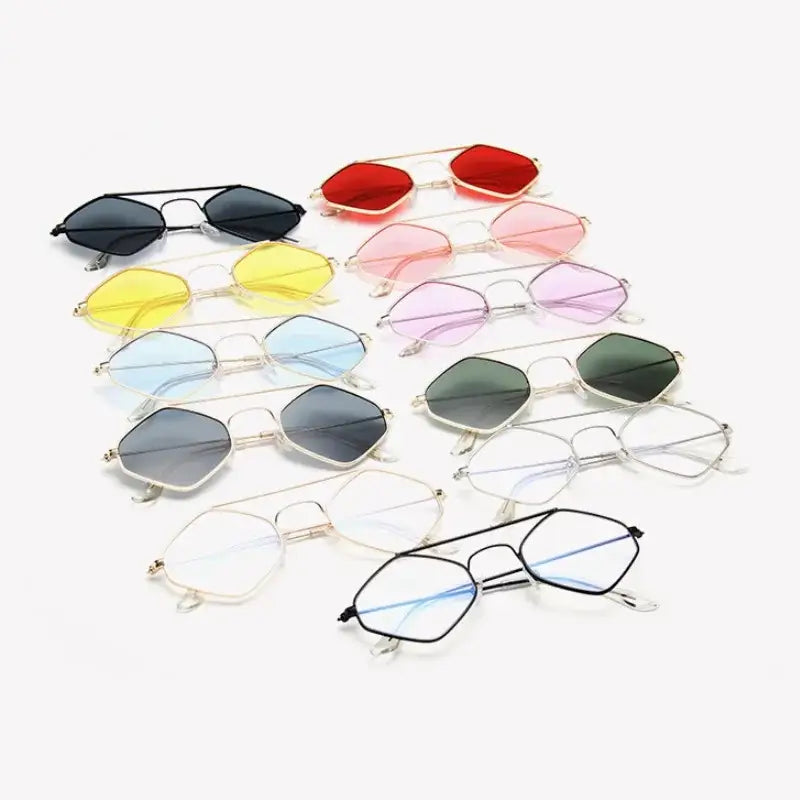 Assorted luxury ladies sunglasses with metal frames in various colors for stylish protection