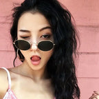 Fashionable luxury oval sunglasses women with a stylish design for trendy summer looks
