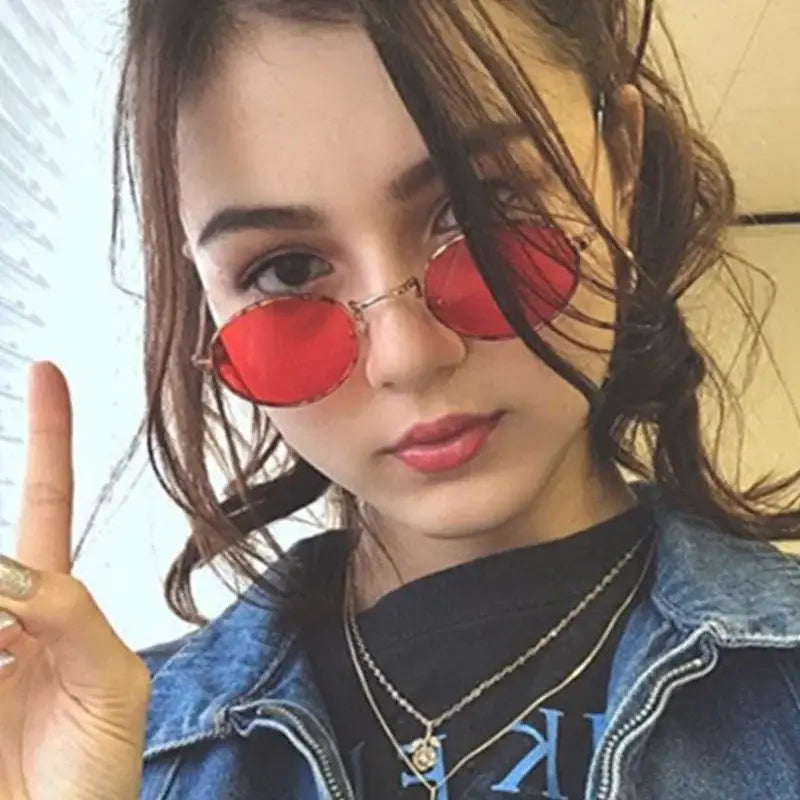 Stylish luxury oval sunglasses women in red with a chic design for summer fashion