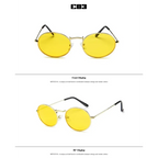 Luxury oval sunglasses women with yellow lenses and bold vintage-inspired design from The Lady's Haven Boutique