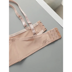 Beige wire support bra and panty set from The Lady's Haven Boutique showing adjustable straps and hook closures