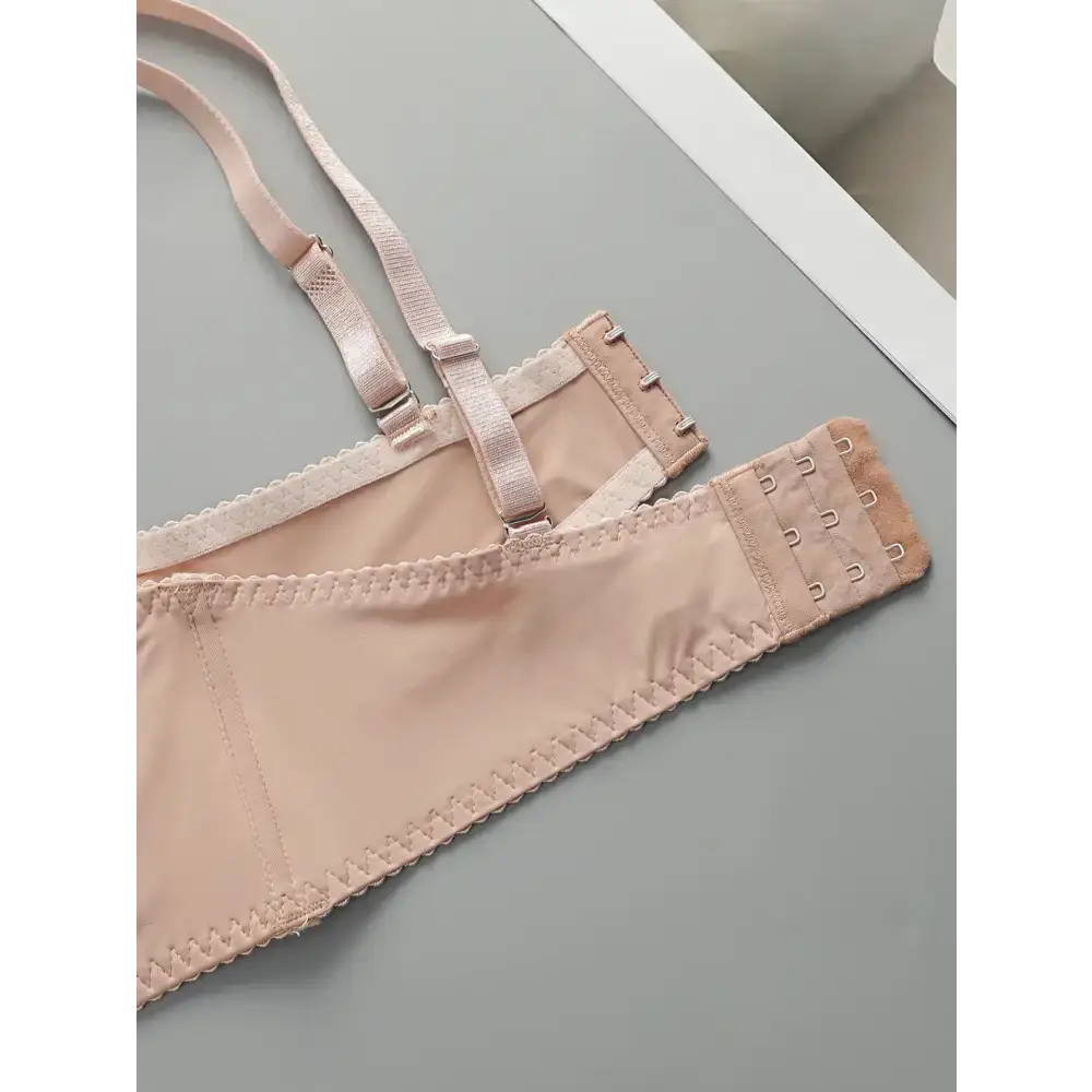 Beige wire support bra and panty set from The Lady's Haven Boutique showing adjustable straps and hook closures