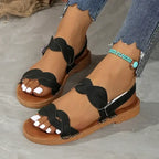 The Ladys Haven Boutique non slip flat heel summer sandals with black straps and brown sole