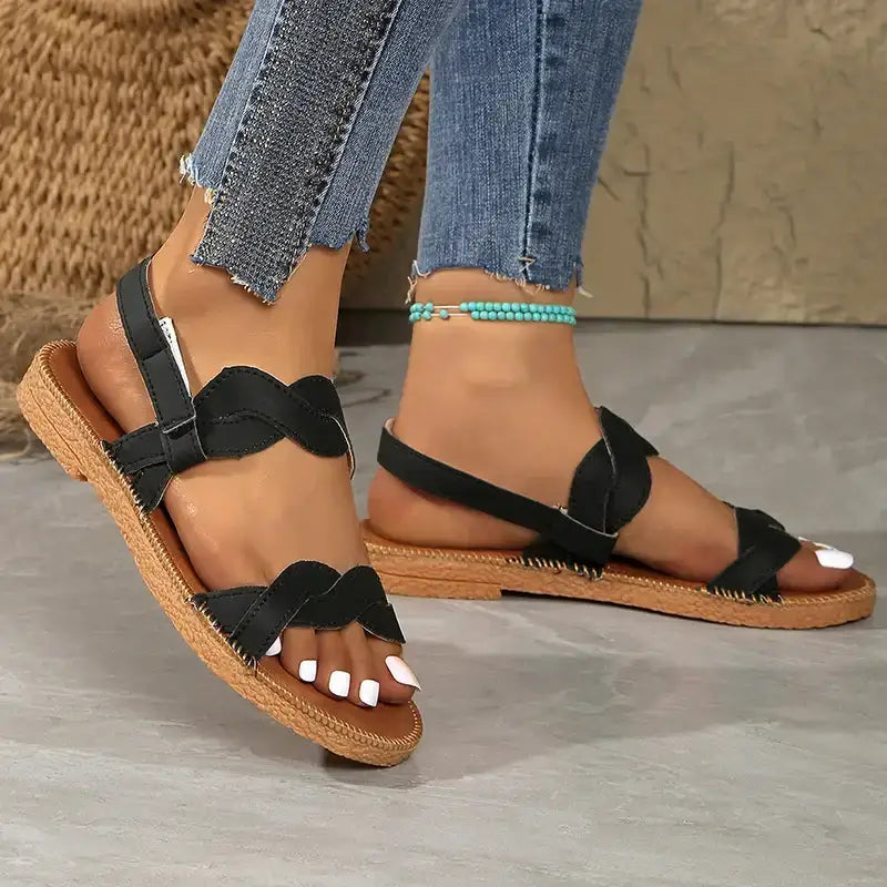The Lady's Haven Boutique non slip flat heel summer sandals in black with woven sole and adjustable straps