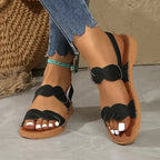 The Lady's Haven Boutique black non slip flat heel summer sandals with braided sole and scalloped straps