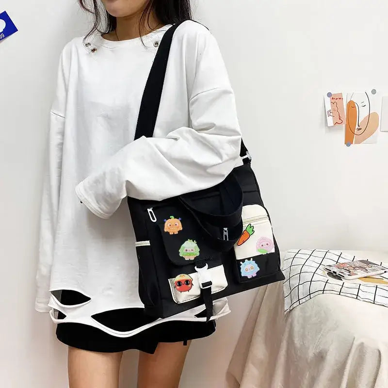 Fashionable nylon crossbody messenger bag with playful patches for casual outings