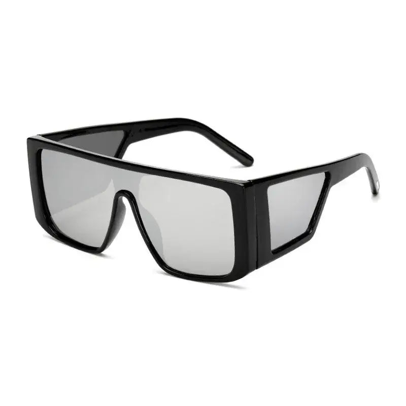 Chic black oversize fashion sunglasses with a bold geometric design and UV protection
