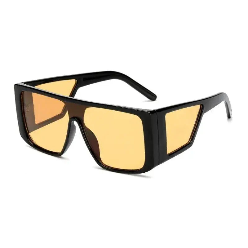 Stylish black oversize fashion sunglasses with amber lenses for a trendy summer look
