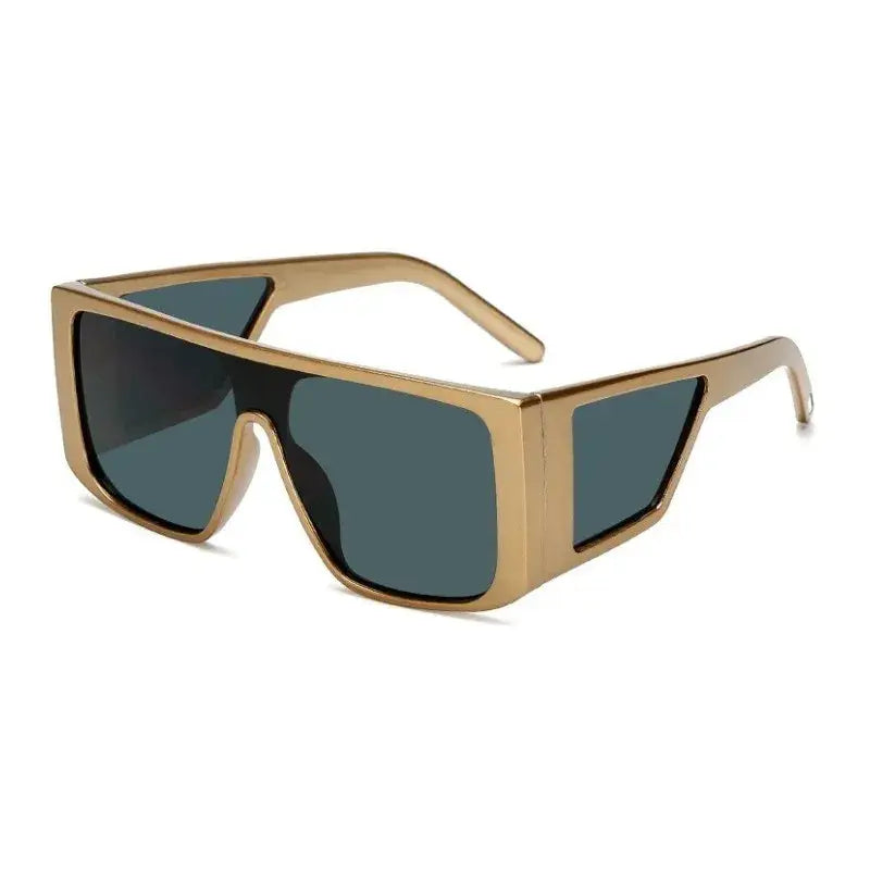 Chic gold oversize fashion sunglasses with large dark lenses for trendy summer looks