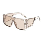 Stylish oversize fashion sunglasses in clear frames with brown tinted lenses for a chic look