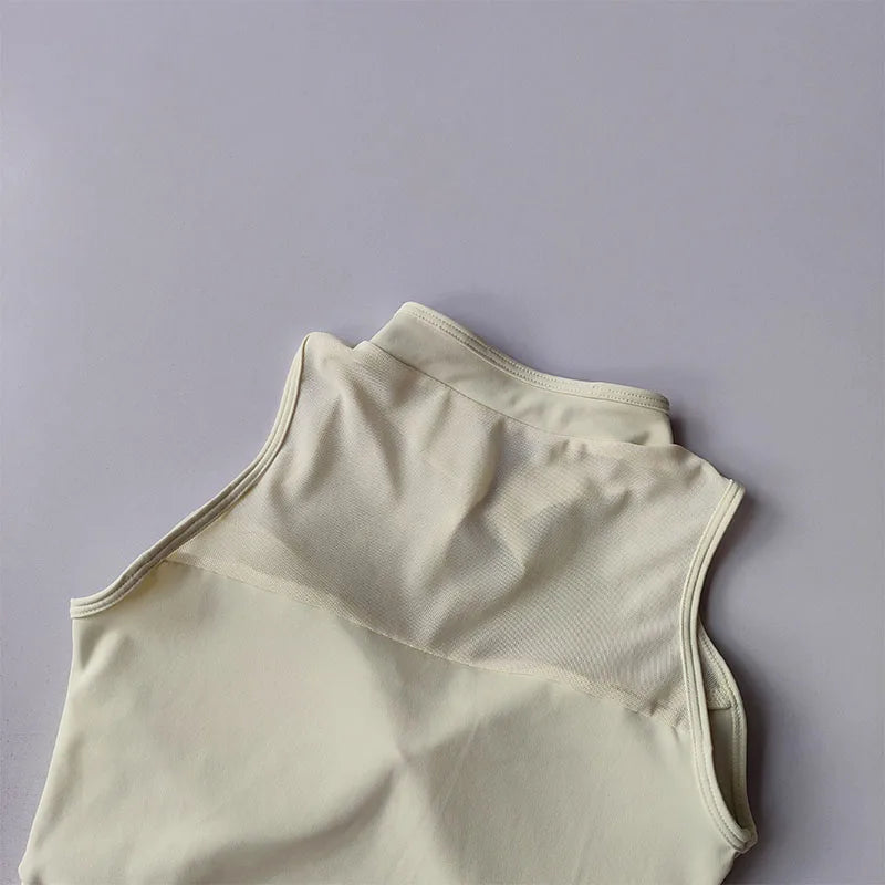 Beige padded gym crop top with a stylish design for comfortable workouts