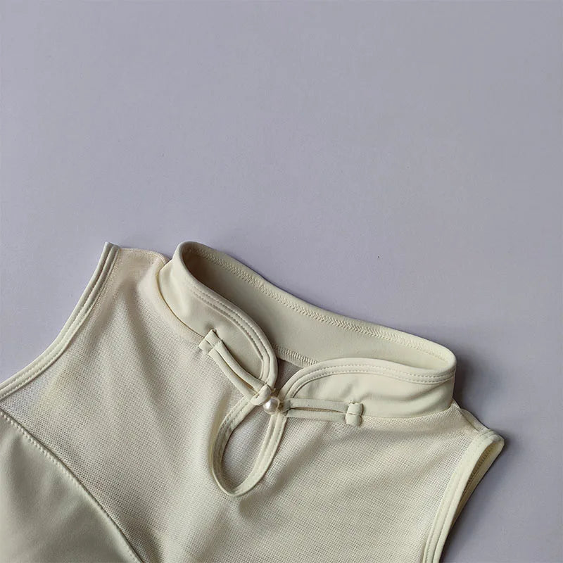 Cream Padded Gym Crop Top with Unique Neckline and Comfortable Fit for Active Wear
