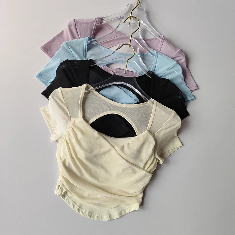 Padded yoga shirts for women displayed in multiple colors including black, blue, purple, and yellow