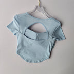 Light Blue Padded Yoga Shirts for Women with Stylish Cut-Out Back Design