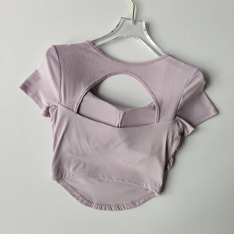 Light lavender padded yoga shirts for women with stylish back cutout design for comfort and flexibility