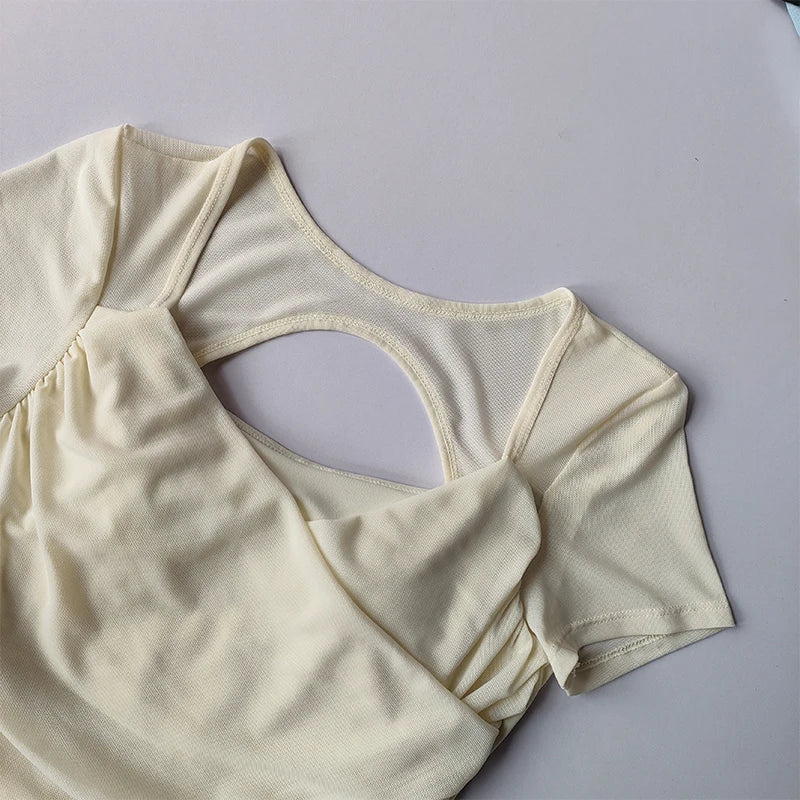 Soft beige padded yoga shirts for women with breathable fabric and stylish design